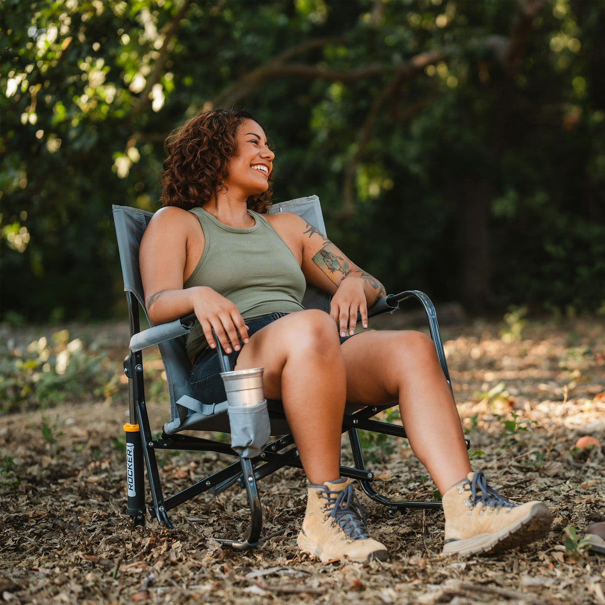 GCI Outdoor Freestyle Rocker XL with Side Table Camping Chair | Portable Folding Rocking Chair with Solid, Durable Armrests, Drink Holder & Comfortable Backrest — Black Father Jim Norris notebooks