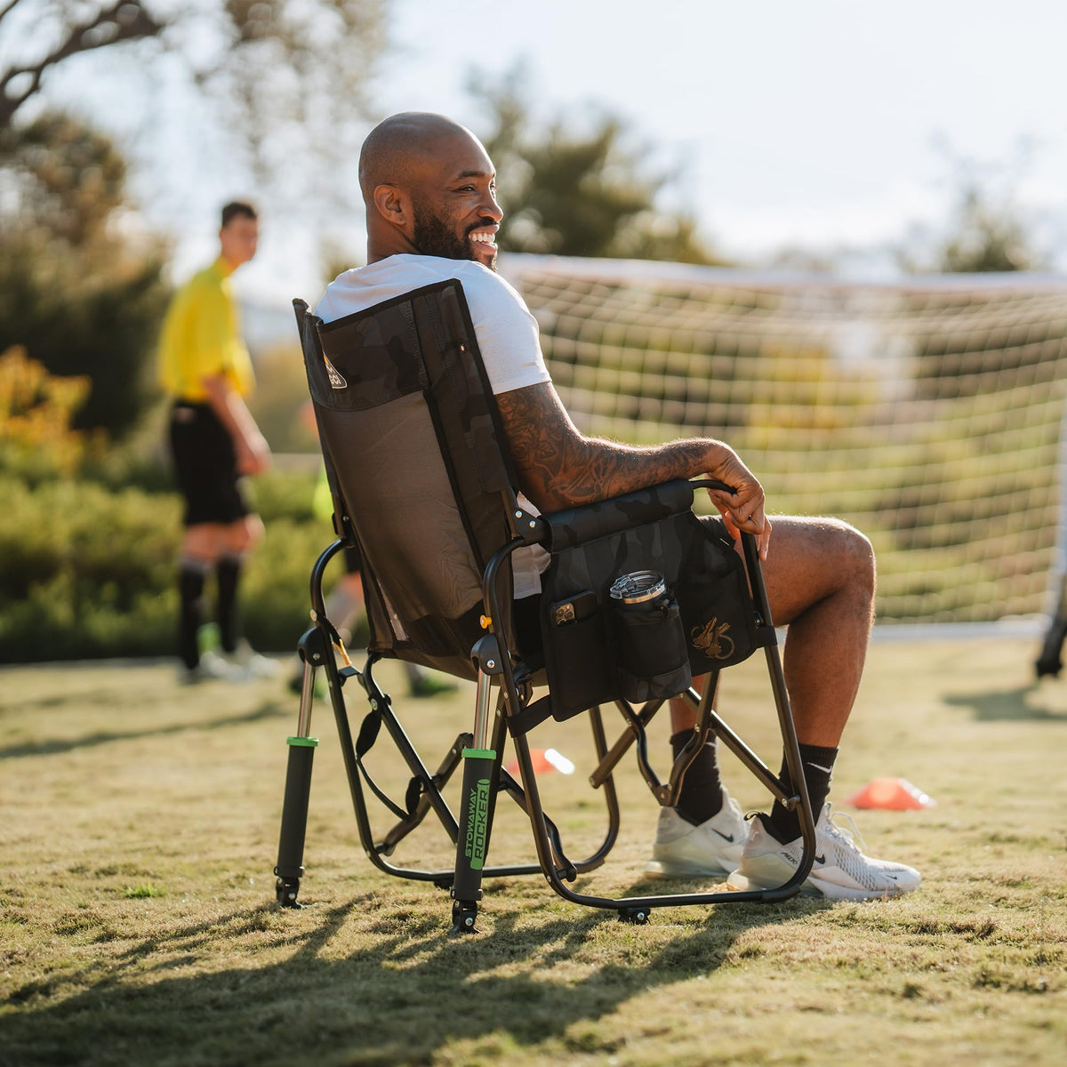 GCI Outdoor Freestyle Rocker XL with Side Table Camping Chair | Portable Folding Rocking Chair with Solid, Durable Armrests, Drink Holder & Comfortable Backrest — Black Father Jim Norris notebooks