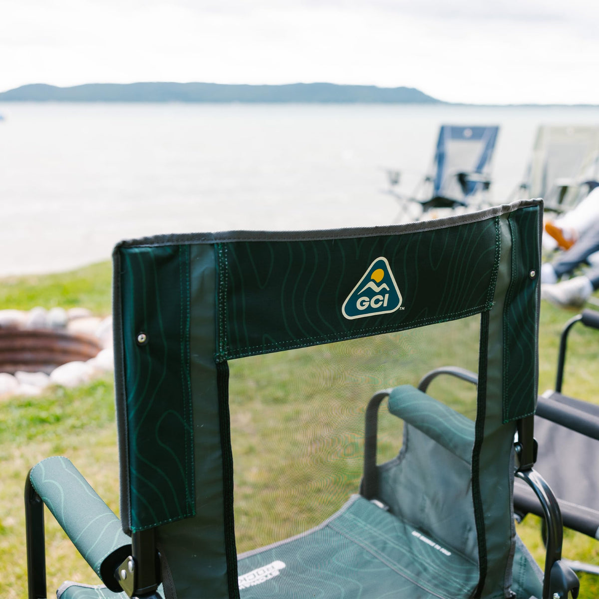 GCI Outdoor Freestyle Rocker XL with Side Table Camping Chair | Portable Folding Rocking Chair with Solid, Durable Armrests, Drink Holder & Comfortable Backrest — Black Father Jim Norris notebooks